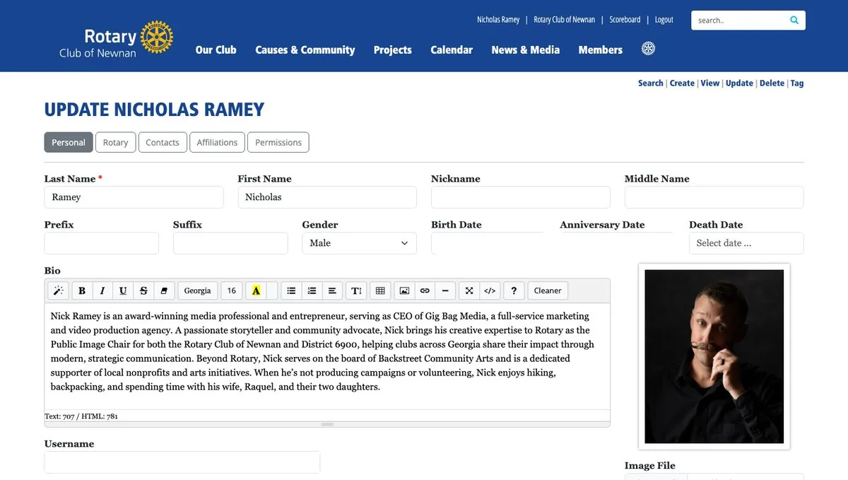 The Update page's Personal tab with name fields, a bio editor, and the current member photo on the right side
